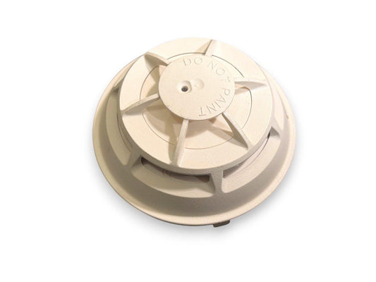 Beige fire alarm detector with 'DO NOT PAINT' label, for smoke and heat detection systems