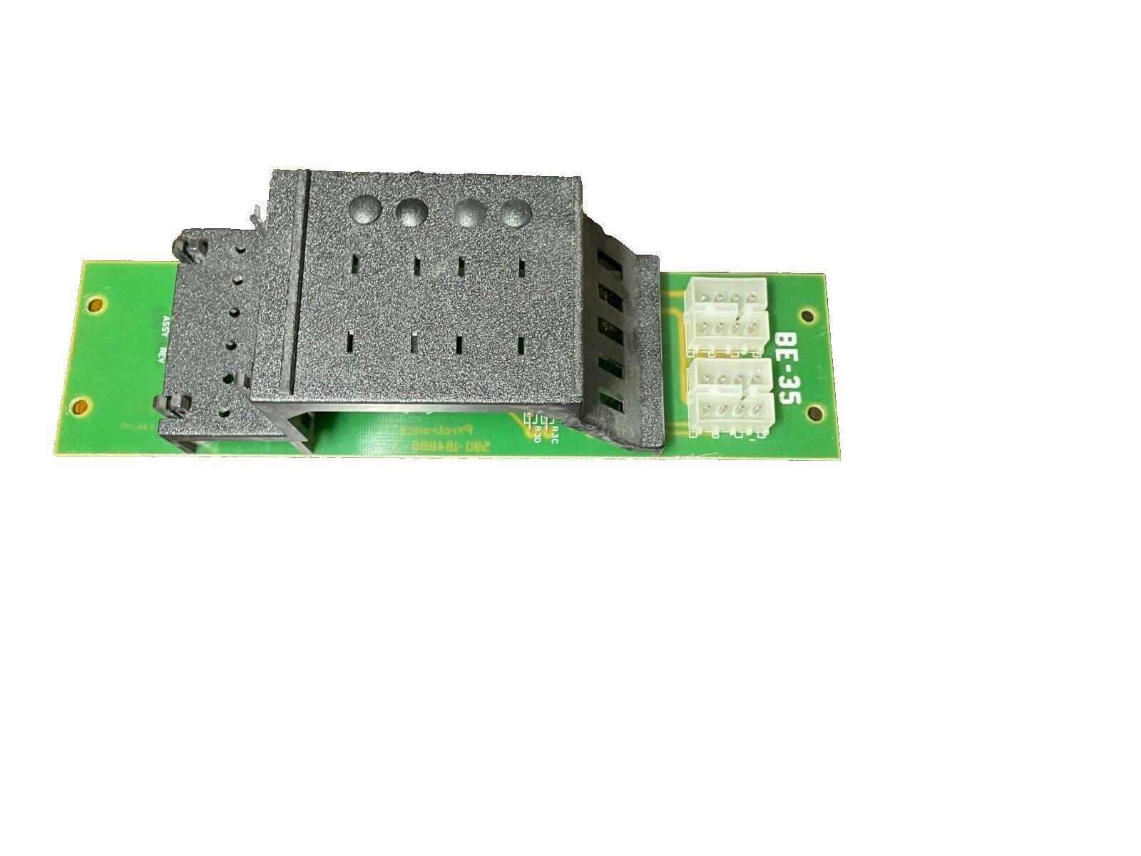 BE-35 fire alarm control panel circuit board with connectors and metal housing