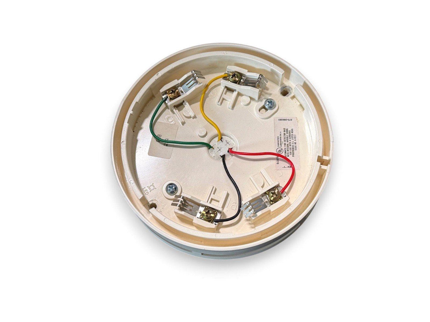 Fire alarm detector base with wiring terminals and color-coded wires for installation