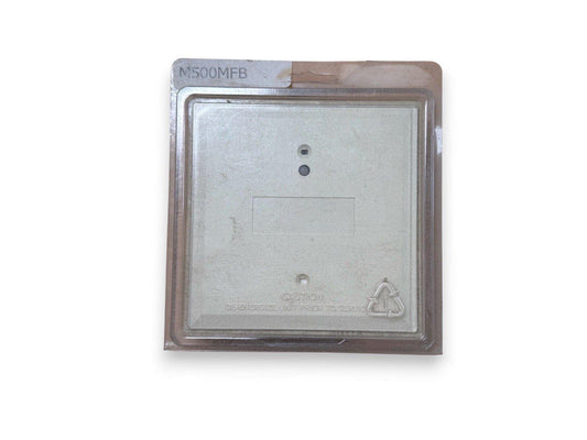 M500MFB fire alarm module in sealed packaging, metal backplate with caution label and recycling symbol