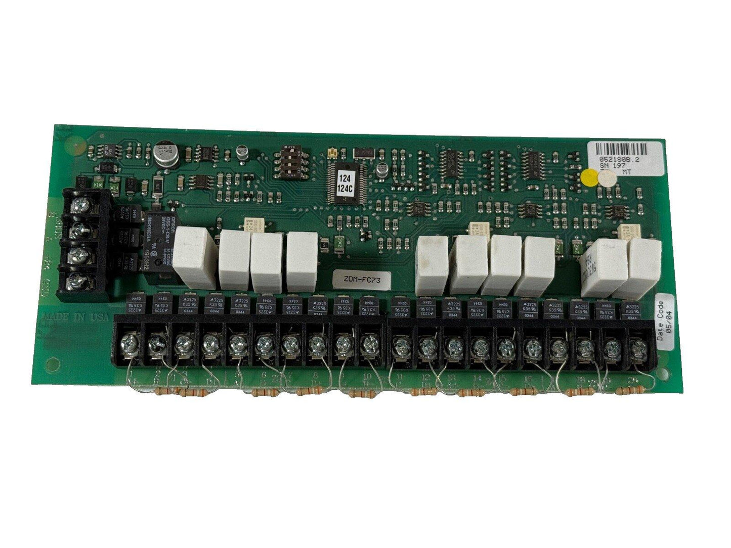Fire alarm control panel circuit board with terminal blocks and components, model ZDM-FC73