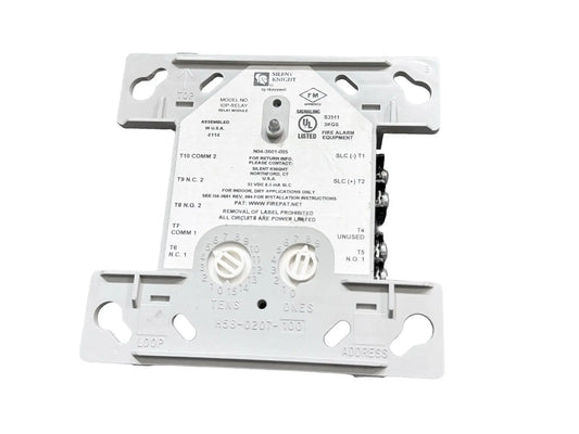 Silent Knight IDP-RELAY Fire Alarm Relay Module in gray, featuring terminals for connections and labeled circuitry.