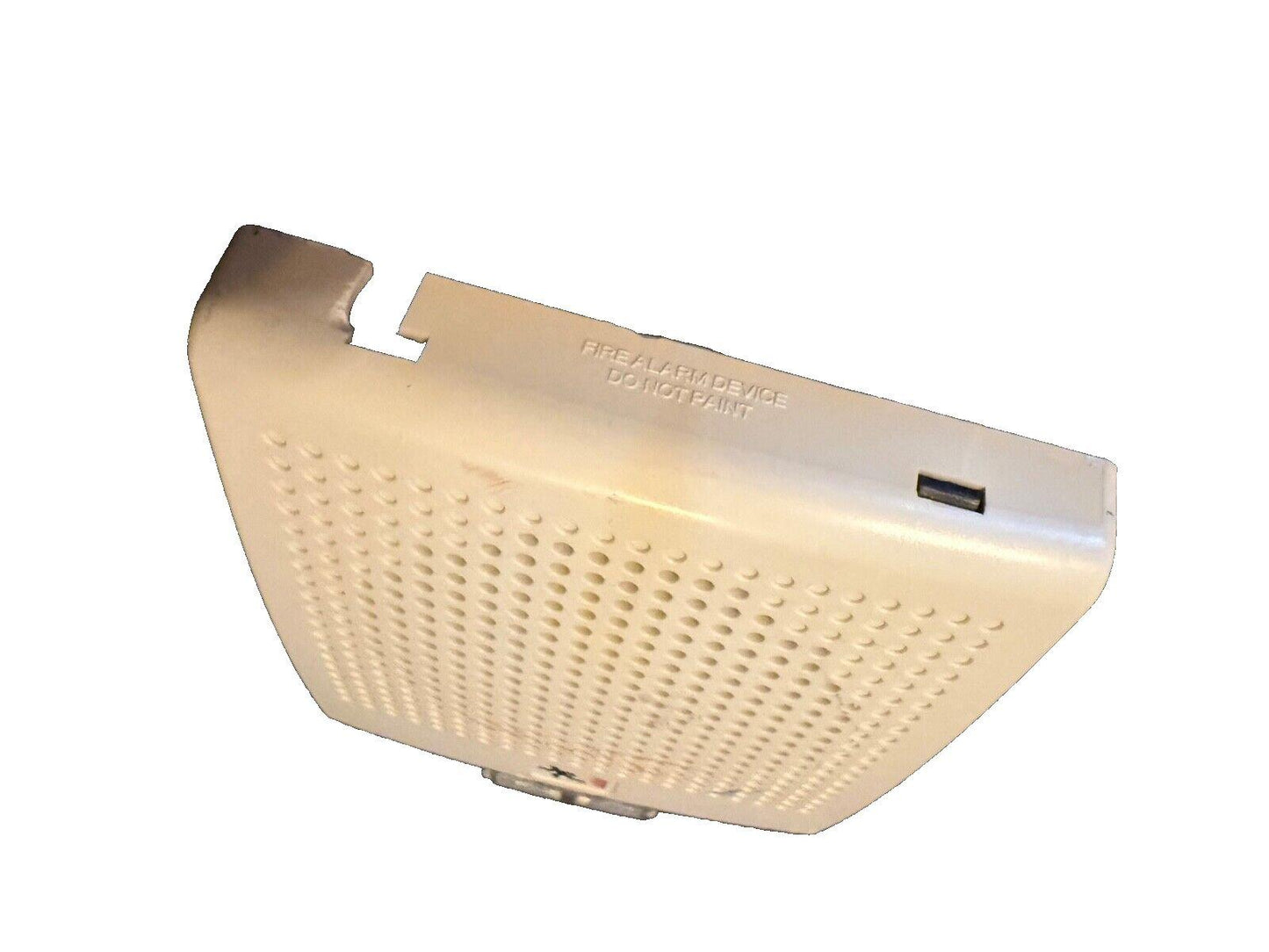 White fire alarm device with perforated cover and 'DO NOT PAINT' label, used safety equipment
