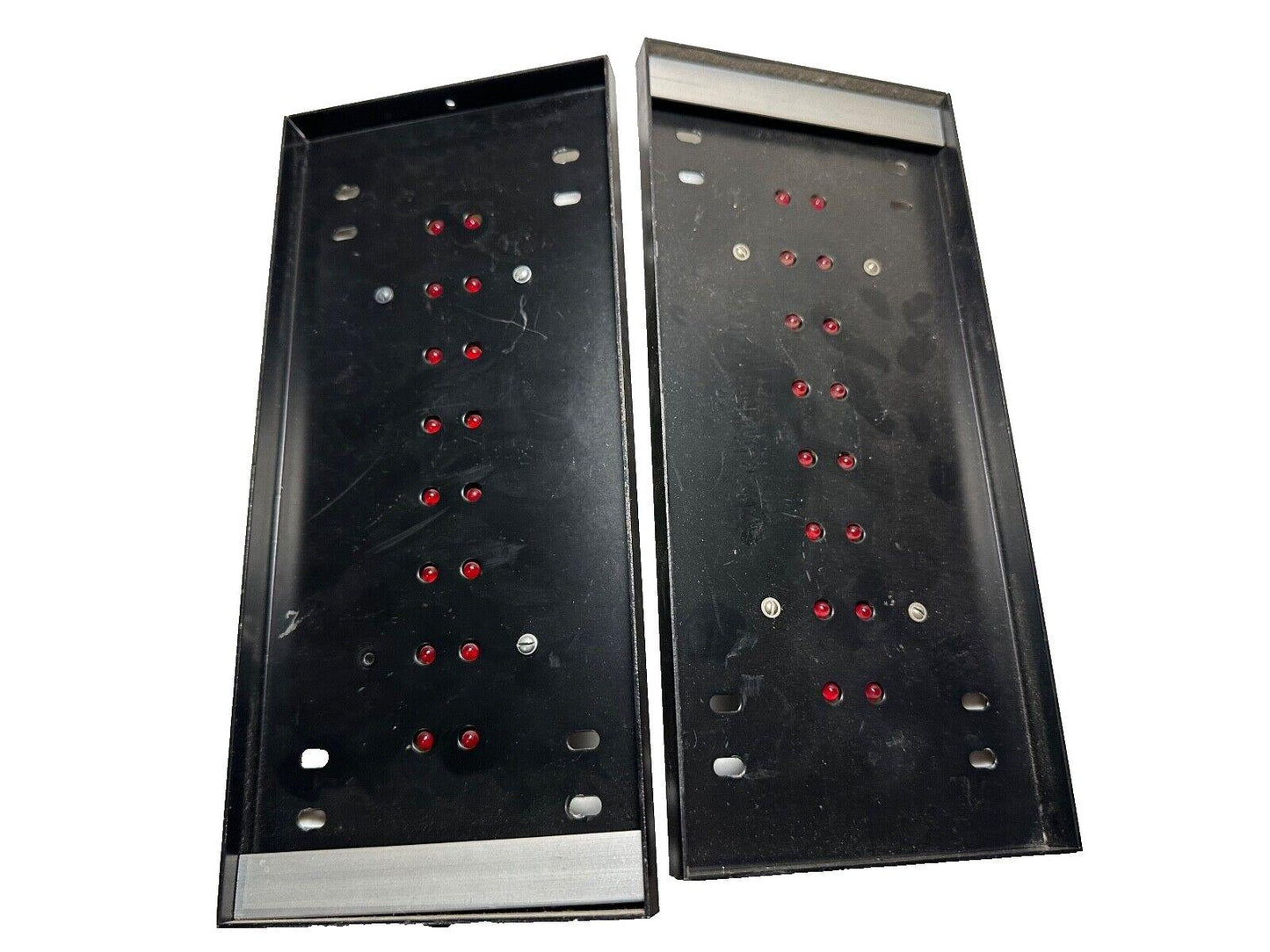 Used fire alarm control panels with red indicator lights, black metal casing, for commercial safety systems