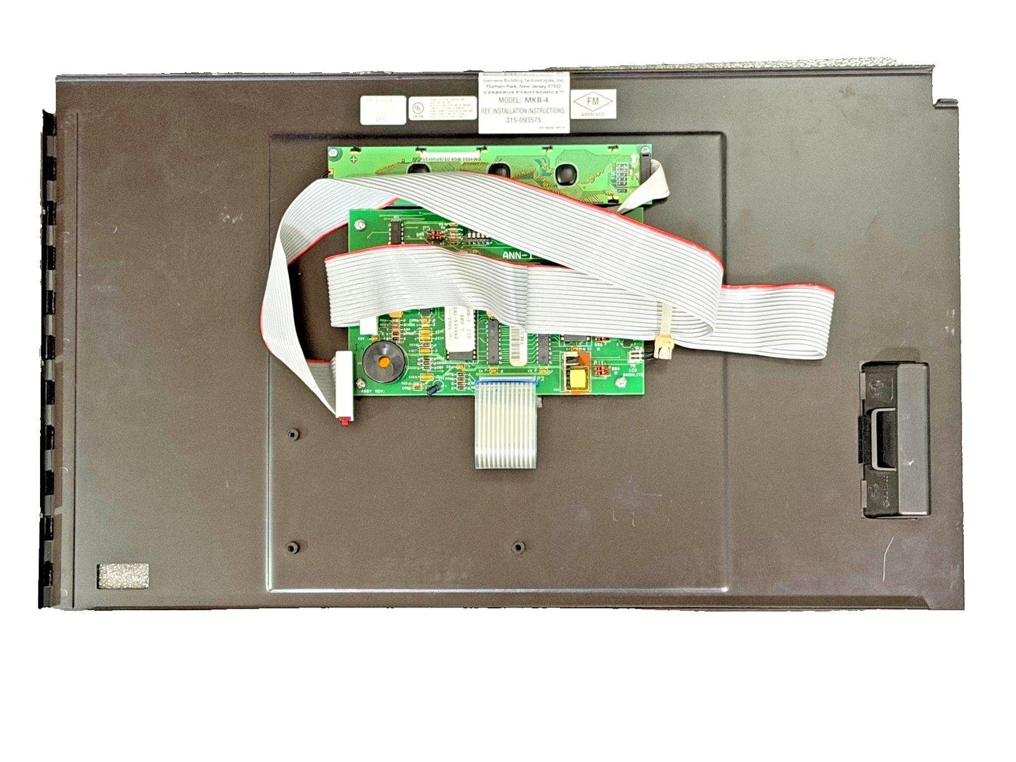 Used fire alarm control panel with circuit boards and ribbon cables, model MKB-4
