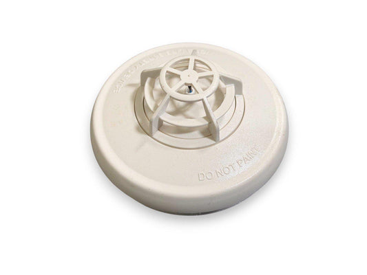 White smoke detector with 'DO NOT PAINT' label, fire alarm safety device