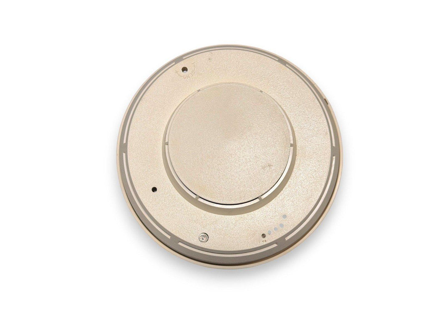 Beige circular fire alarm detector with mounting holes and indicator lights