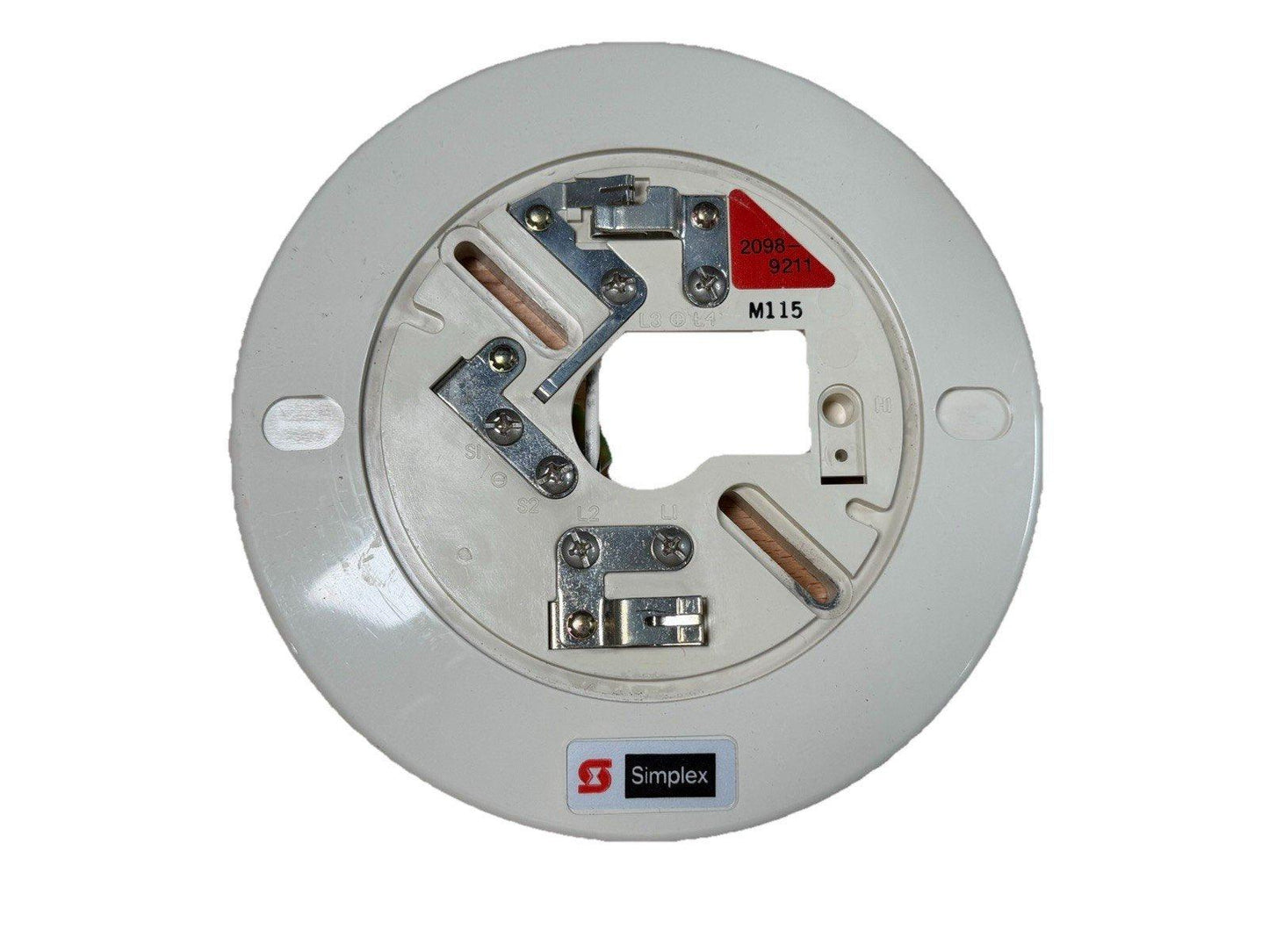 Simplex M115 fire alarm device with terminal connections and red label, white circular housing