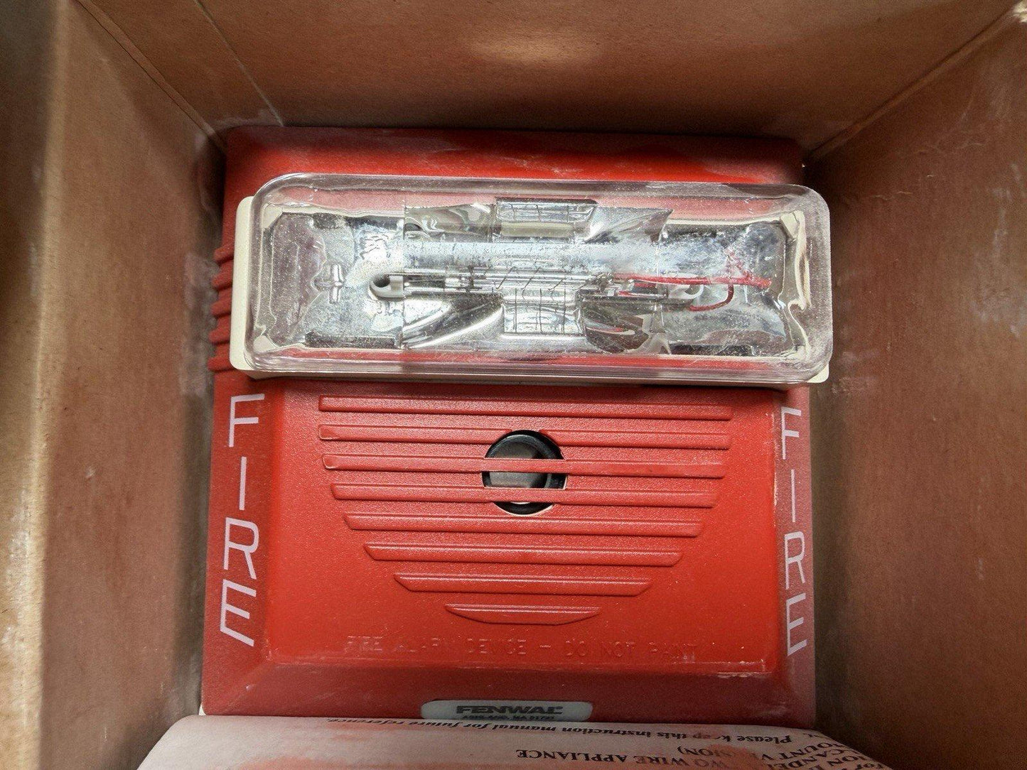 Red Fenwal fire alarm horn strobe in box, used fire safety equipment
