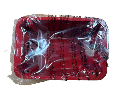 Red fire alarm pull station cover in plastic wrap, safety equipment for fire protection systems