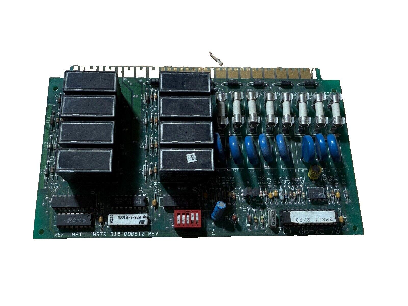Fire alarm control panel circuit board with relays, fuses, and capacitors for fire safety systems