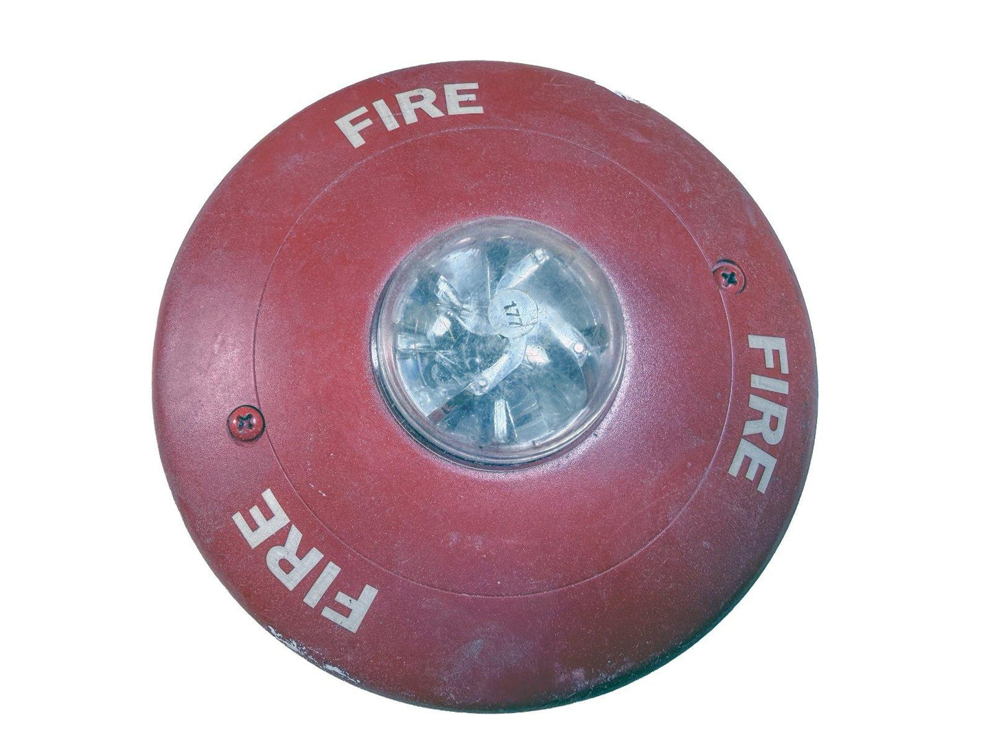 Red fire alarm strobe light with 'FIRE' text, used fire safety equipment