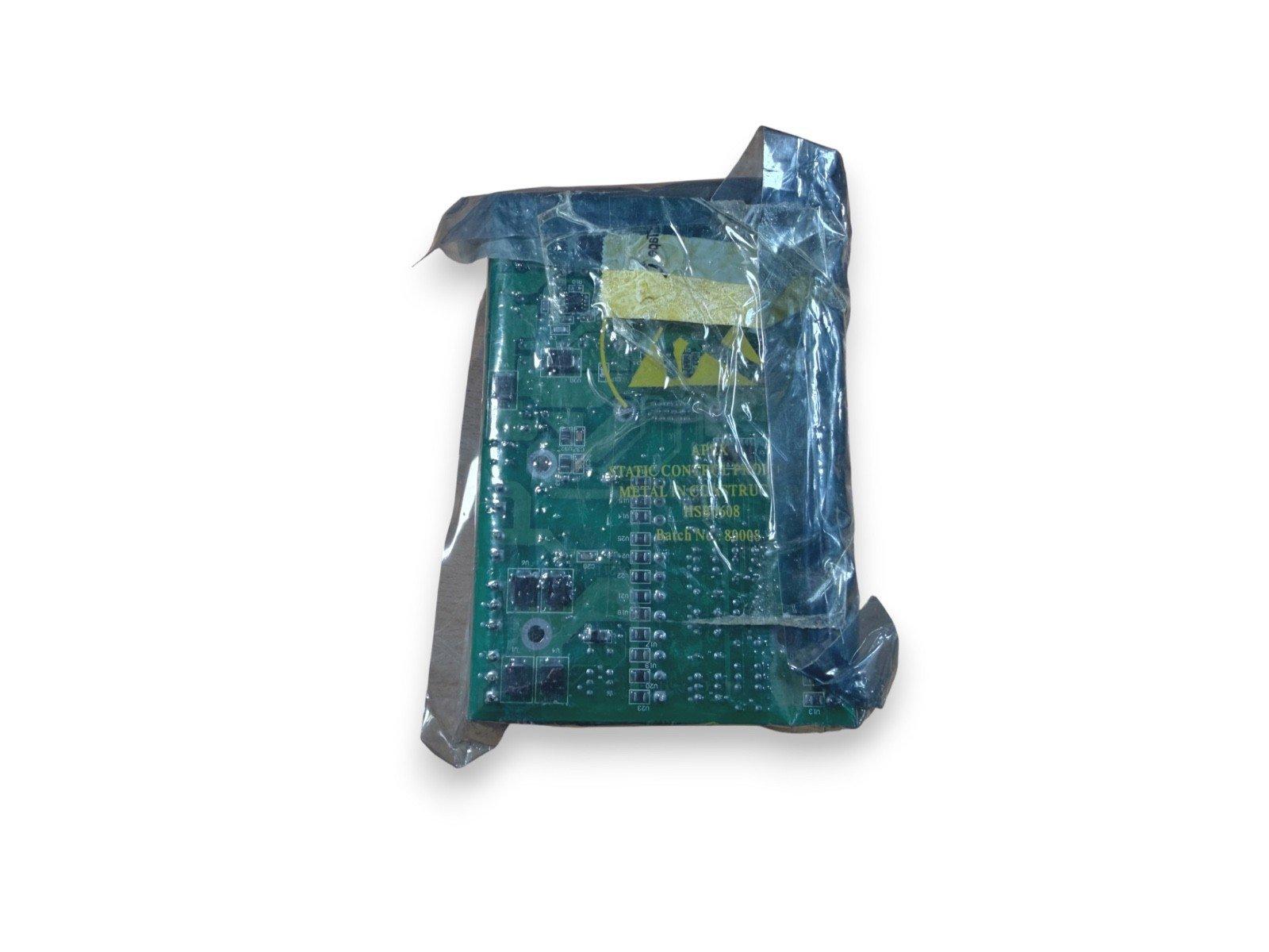 Green fire alarm control panel circuit board in anti-static packaging, labeled HSE608