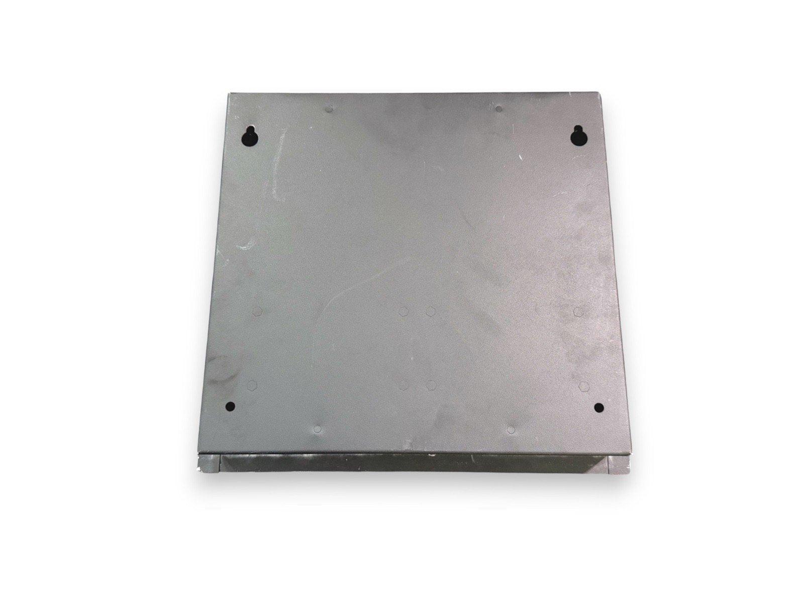 Metal fire alarm control panel backplate with mounting holes