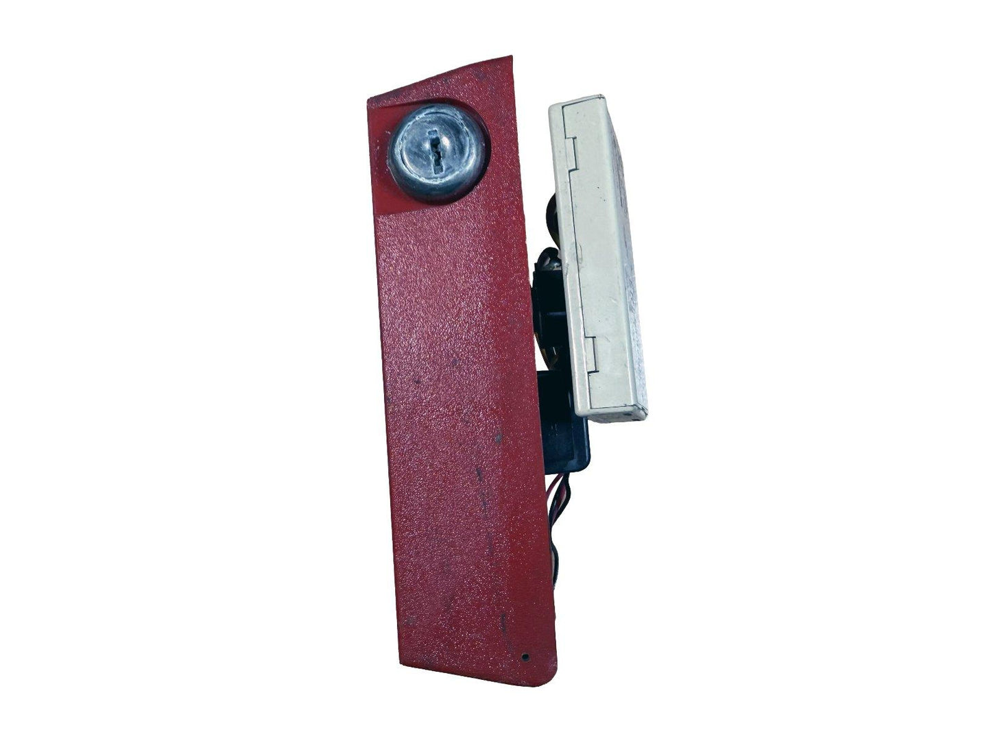Red fire alarm pull station with keyhole and wiring, used fire safety equipment