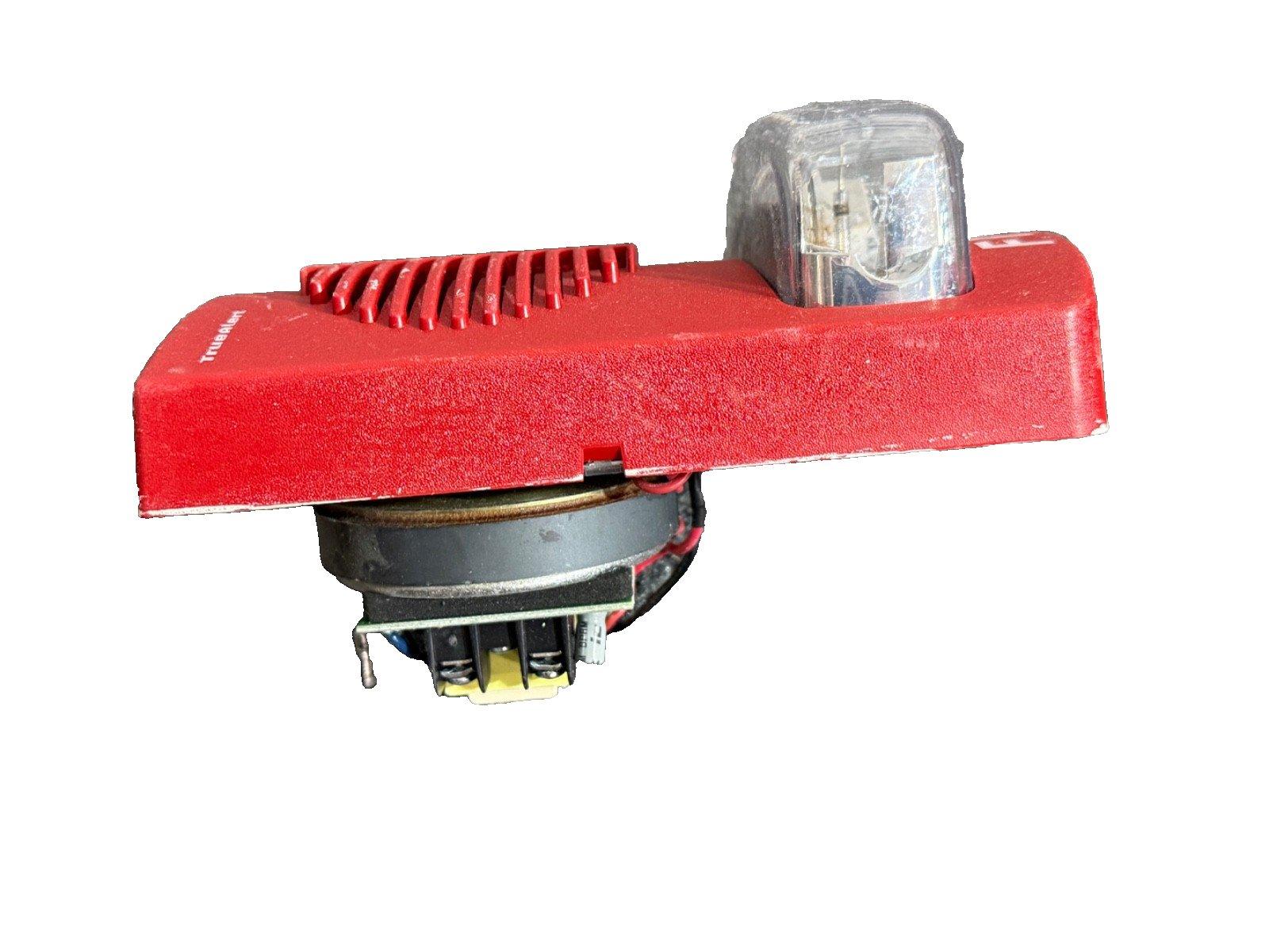 Red fire alarm strobe light with speaker, used fire safety equipment