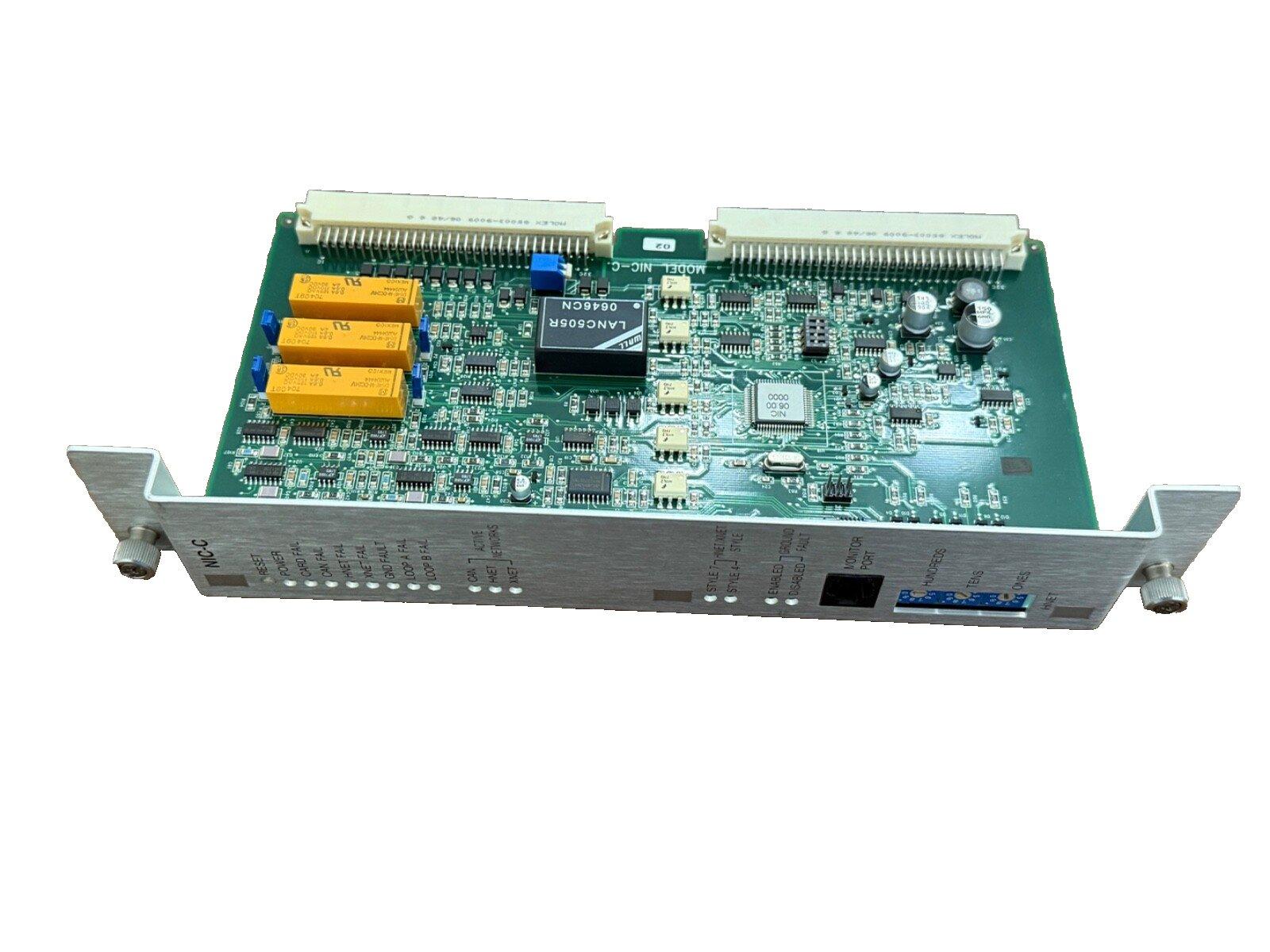 Fire alarm control panel circuit board with NIC-C module and network connectors for commercial systems