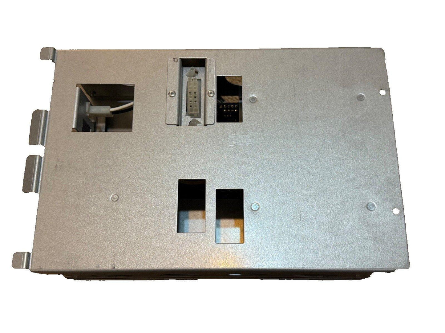Metal fire alarm control panel back with connectors and mounting slots