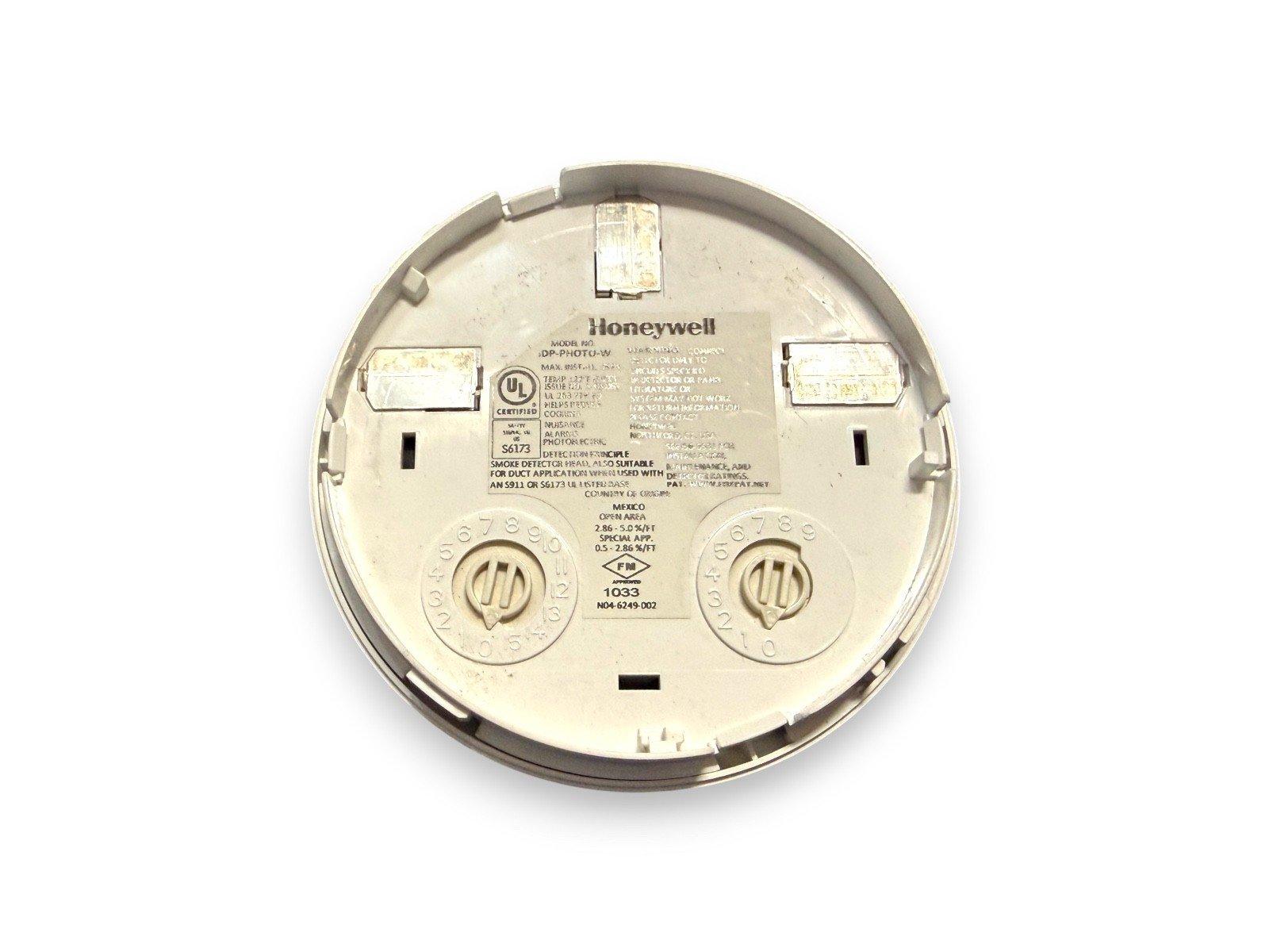 Honeywell DP-PHOTO-W photoelectric smoke detector back view with UL certification and wiring terminals
