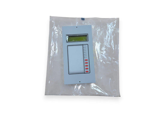 Fire alarm control panel with LCD display and red buttons, sealed in plastic packaging