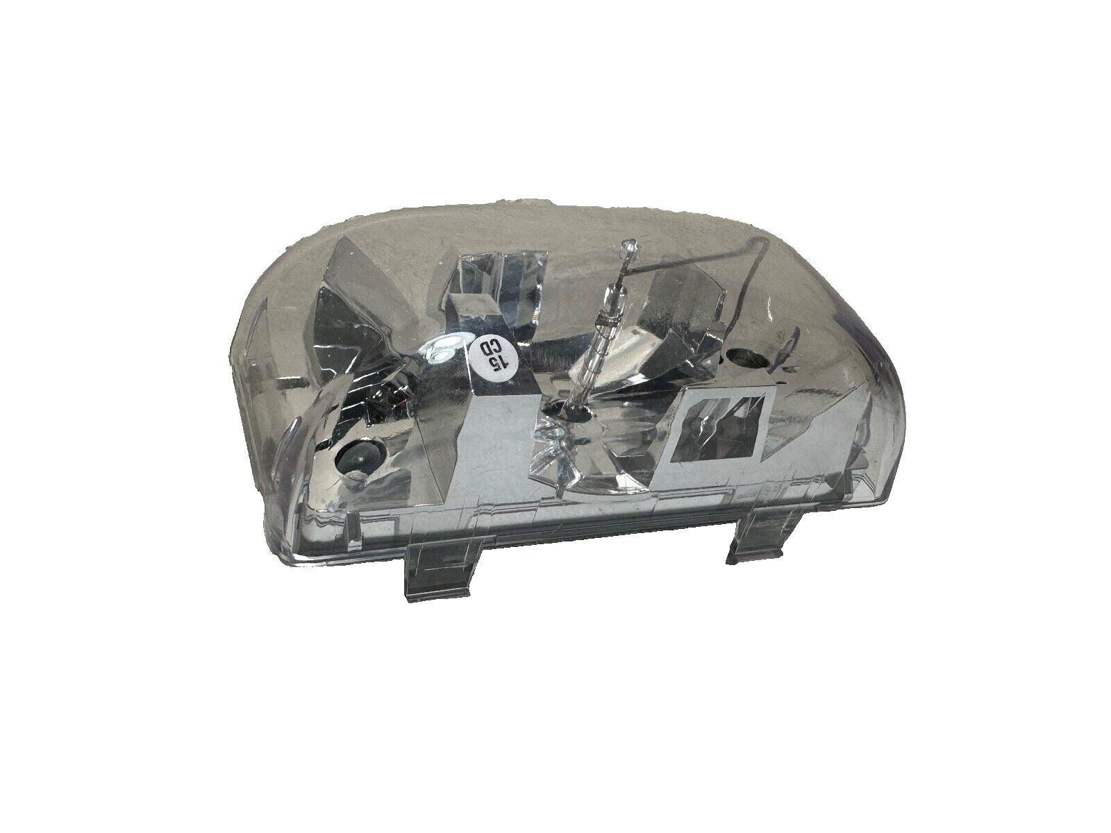 Clear plastic fire alarm strobe light housing with internal components visible