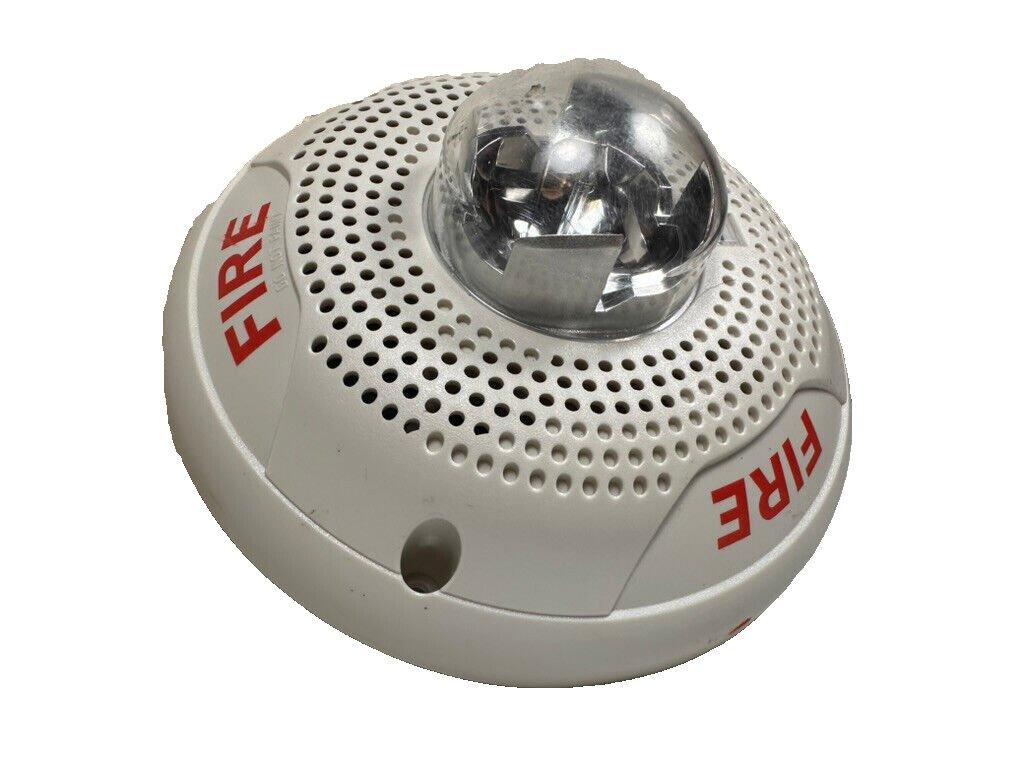 White fire alarm strobe with red FIRE label and clear lens for emergency signaling