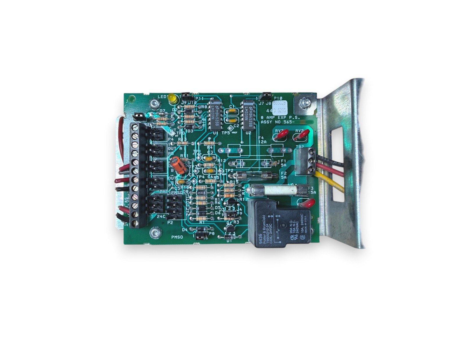 Fire alarm control panel circuit board with 8A power supply, relays, and terminal blocks for fire safety systems