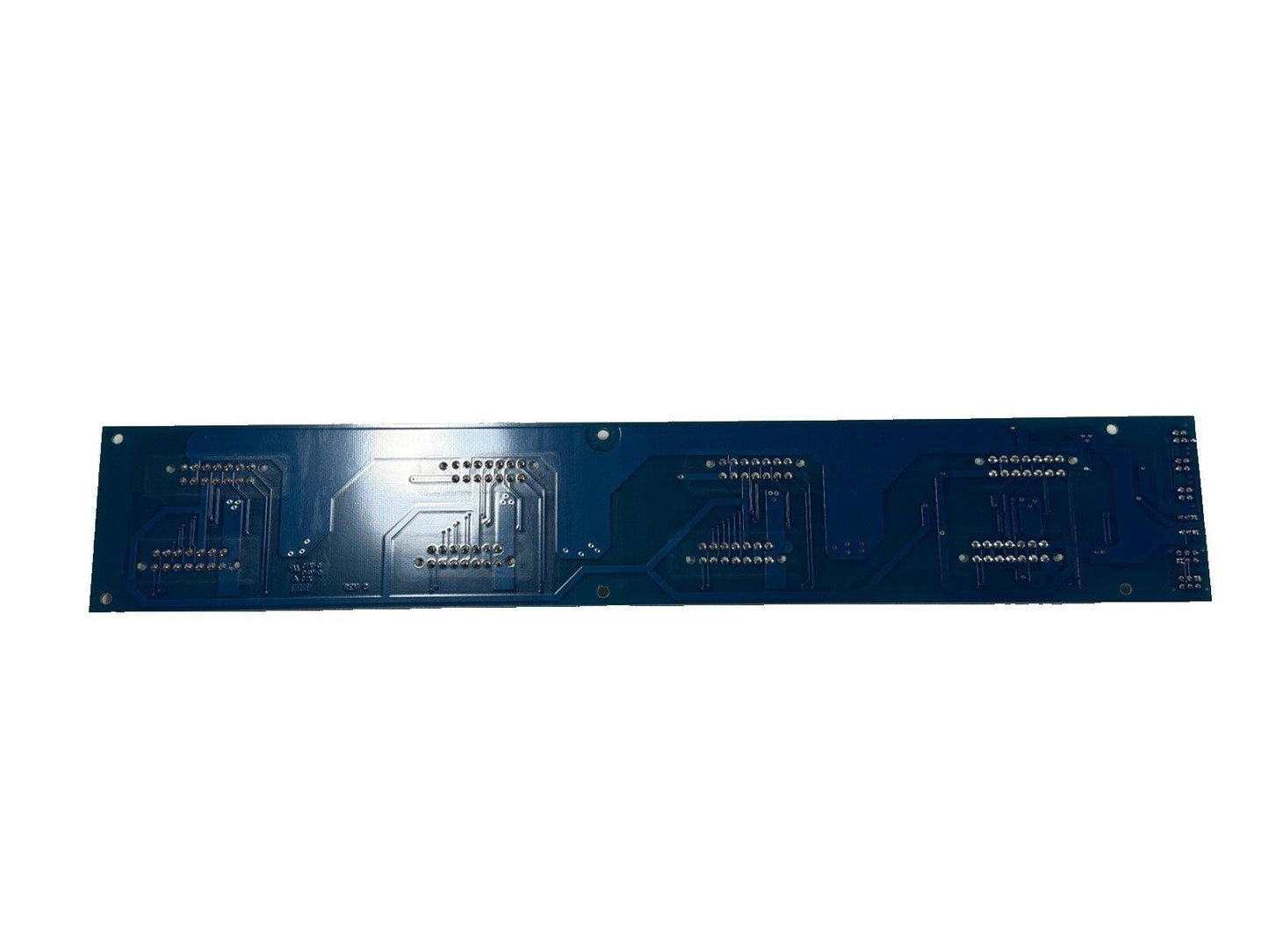 Blue fire alarm control panel circuit board with multiple connectors and mounting holes
