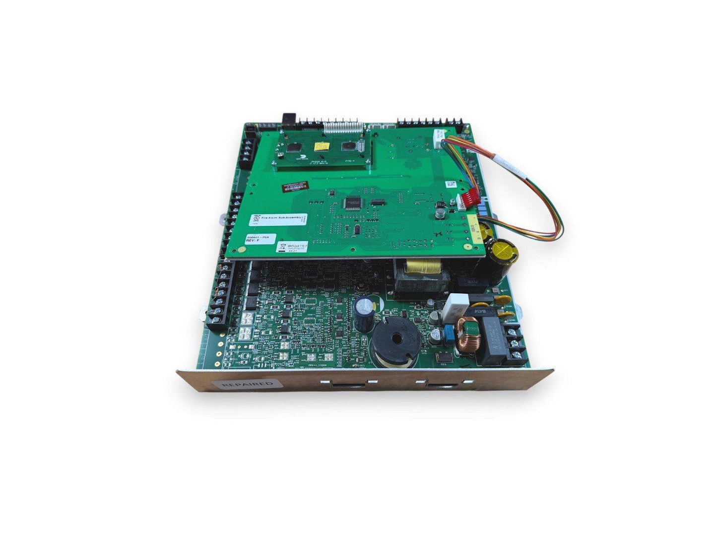 Repaired fire alarm control panel circuit board with wiring and components