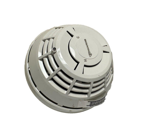 Edwards fire alarm smoke detector with H and C labels, white circular design for safety systems