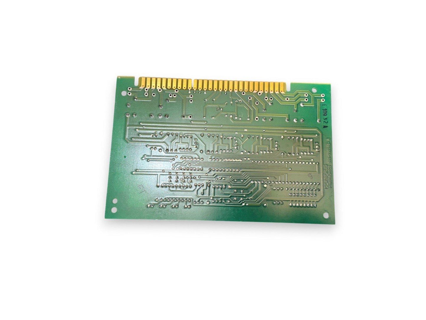 Green fire alarm control panel circuit board with gold connectors, used in fire safety systems