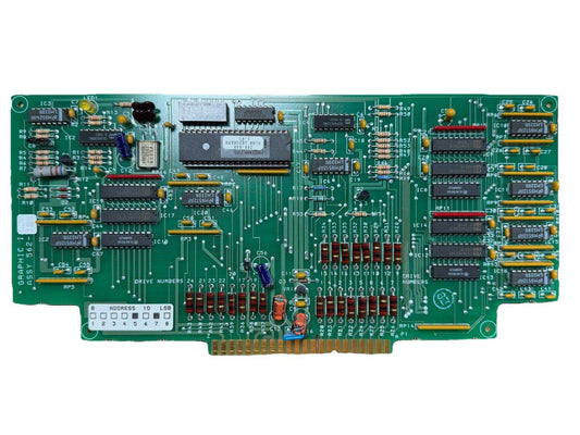 Green fire alarm control panel circuit board with ICs, resistors, and connectors for fire safety systems