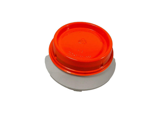 Bright orange fire alarm cover with gray base, used for protecting fire alarm devices