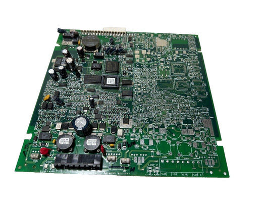 Fire alarm control panel circuit board with capacitors, chips, and loop connectors for fire safety systems