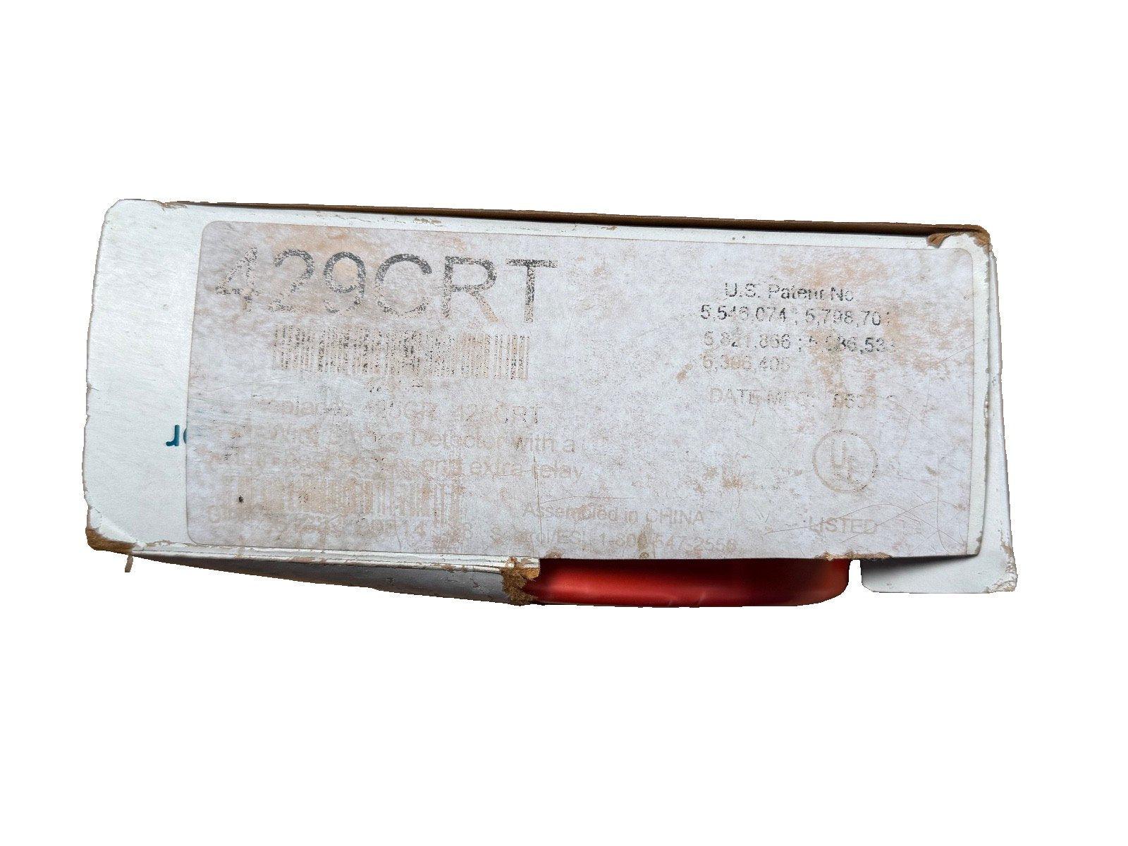 429CRT fire alarm smoke detector in original packaging, used surplus equipment