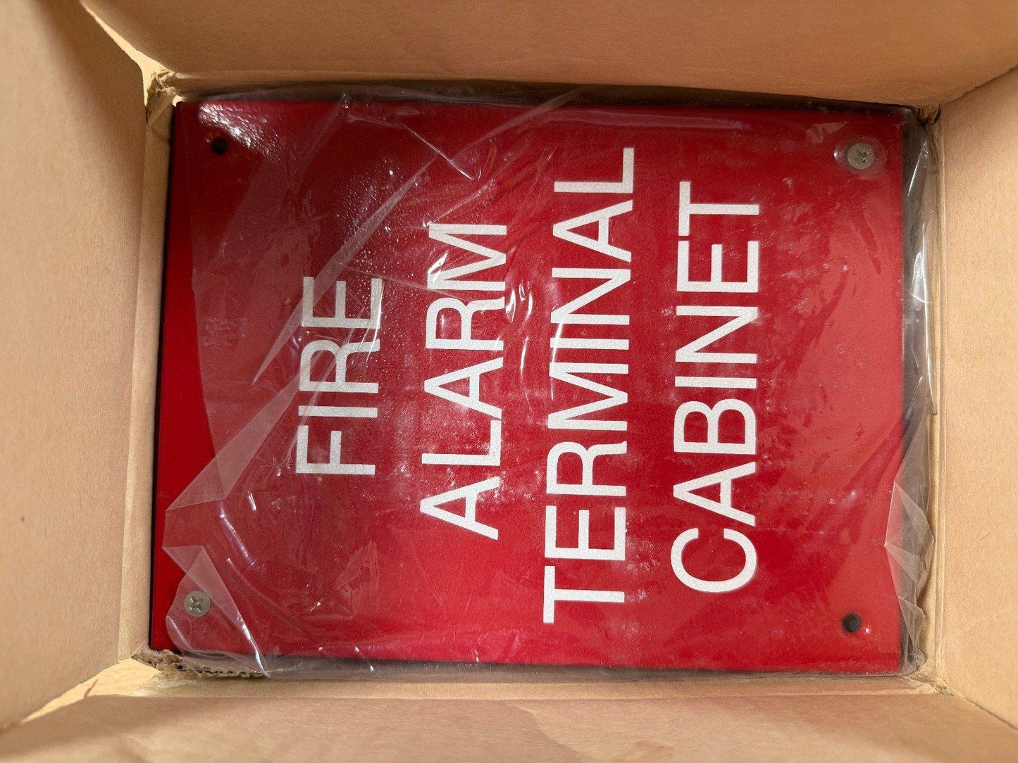 Red fire alarm terminal cabinet sign in box, new fire safety equipment