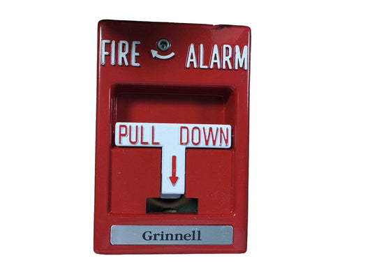 Red Grinnell fire alarm pull station with 'PULL DOWN' handle for emergency use