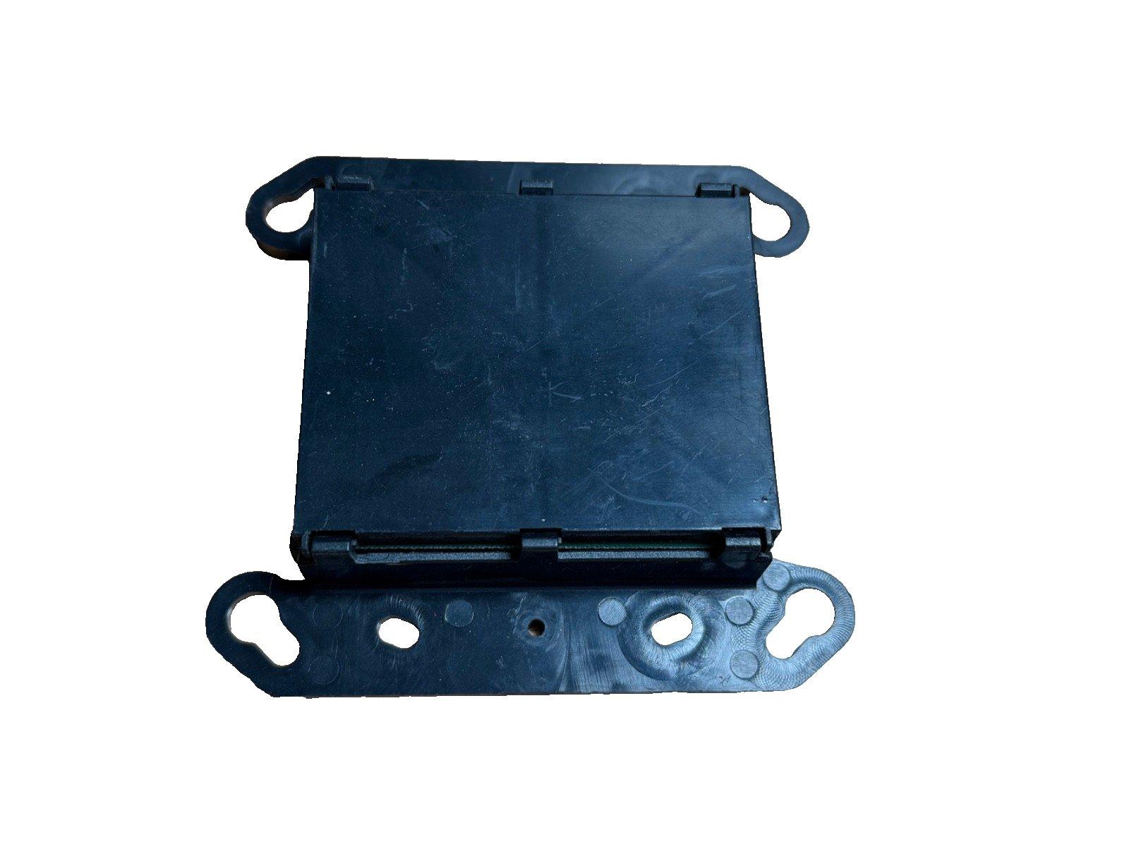 Black fire alarm control panel enclosure with mounting bracket, used fire alarm equipment