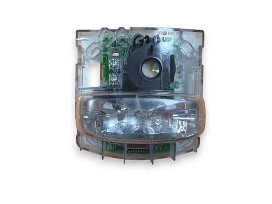 Fire alarm strobe light with clear housing and internal circuitry, showing LED and speaker components