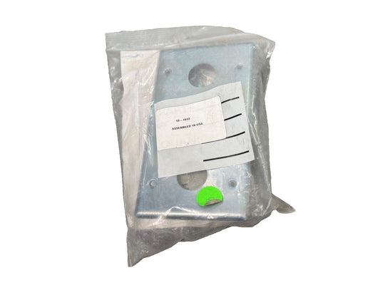 Fire alarm mounting bracket in plastic bag, labeled 10-1643, assembled in USA
