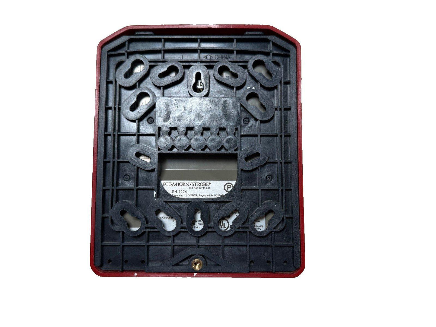 Back view of fire alarm horn strobe device with mounting slots and wiring terminals, model SH-1224