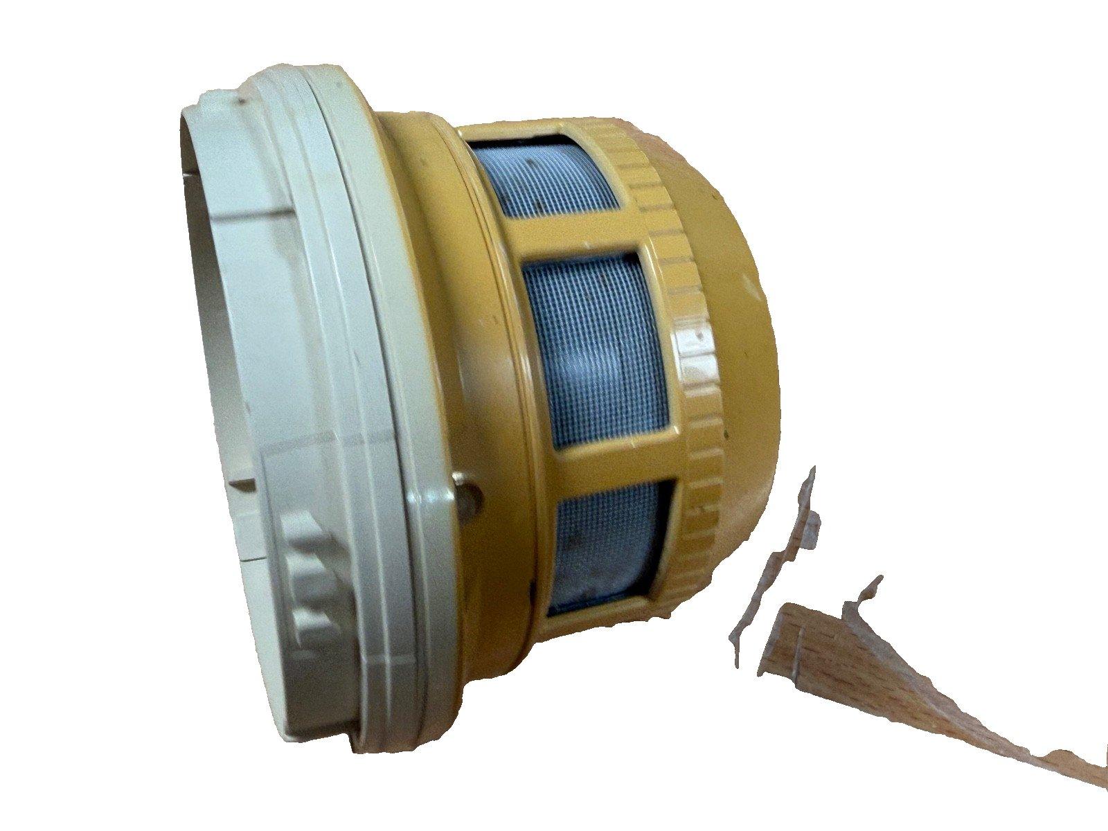 Yellow fire alarm horn speaker with white base and mesh grille, used fire safety equipment