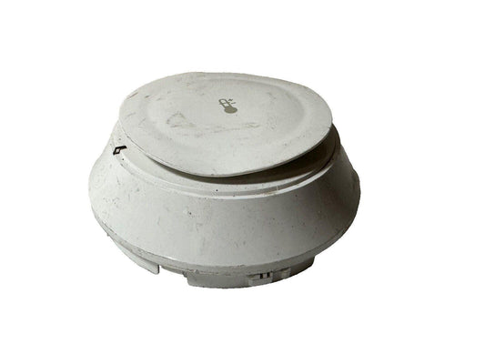 White fire alarm heat detector with temperature symbol, used fire safety equipment