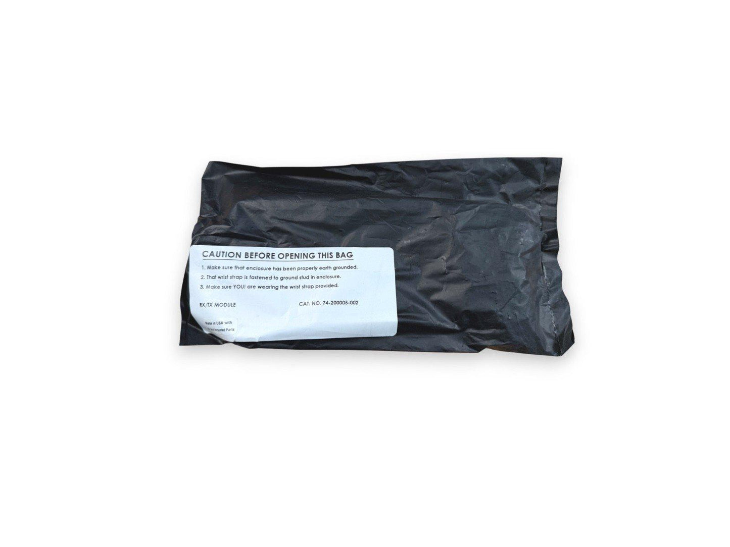 RX/TX module in anti-static bag with caution label for fire alarm systems