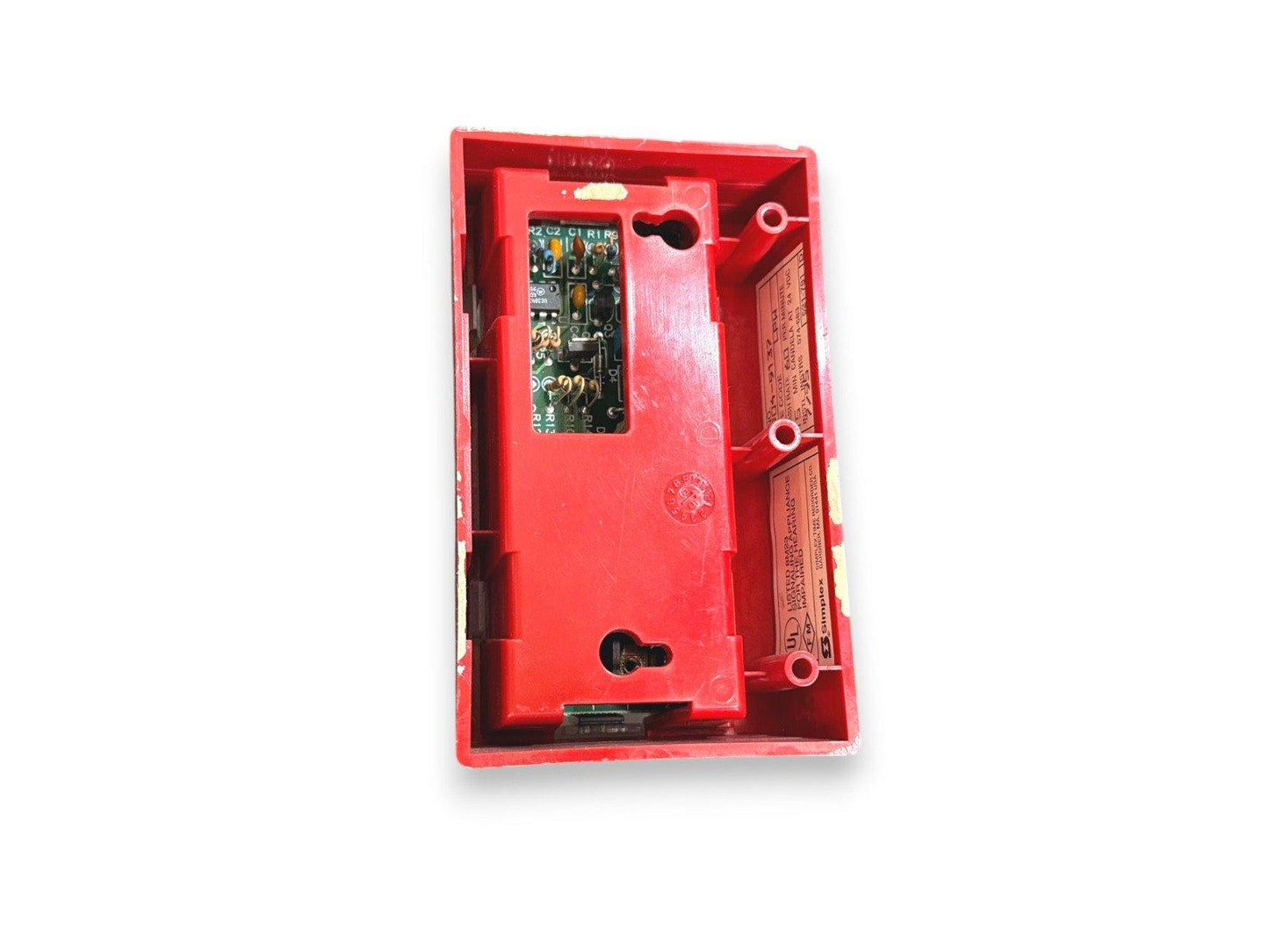 Red fire alarm pull station with exposed circuit board and wiring terminals
