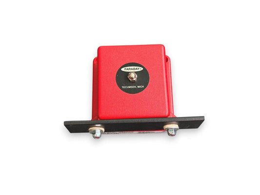 Red Faraday fire alarm device with black base, labeled Tecumseh, Mich for commercial safety systems