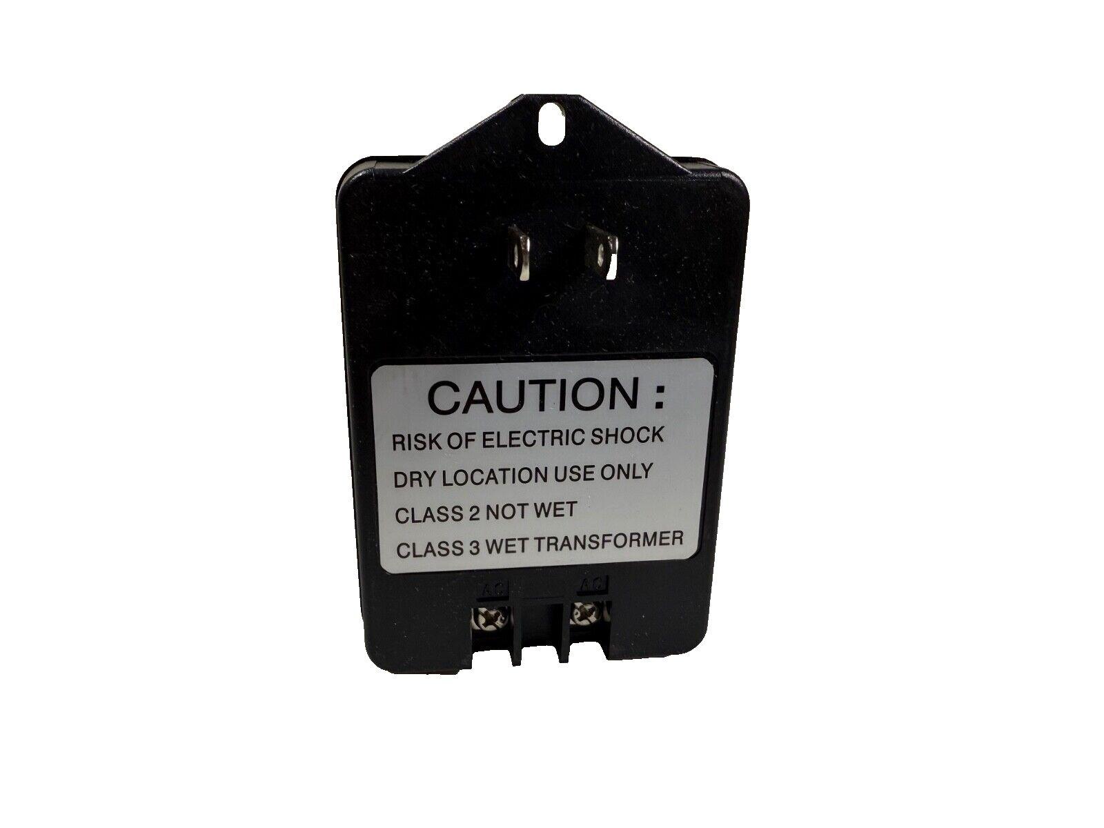 Black Class 3 wet transformer for fire alarm systems, dry location use only, with caution label