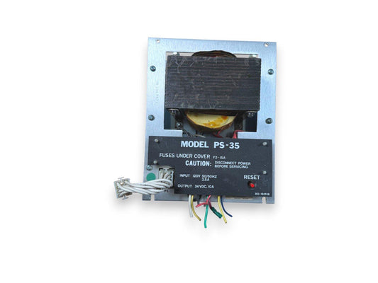 Model PS-35 fire alarm power supply with 24VDC output, reset button, and wiring terminals for fire safety systems
