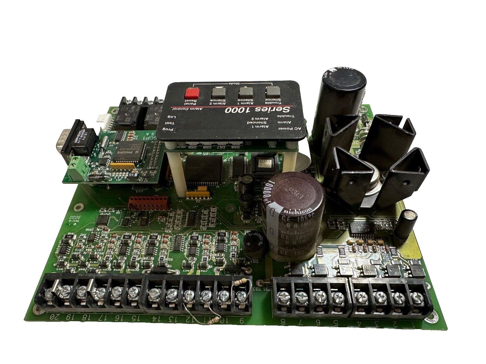 Series 1000 fire alarm control panel circuit board with terminal blocks and capacitors