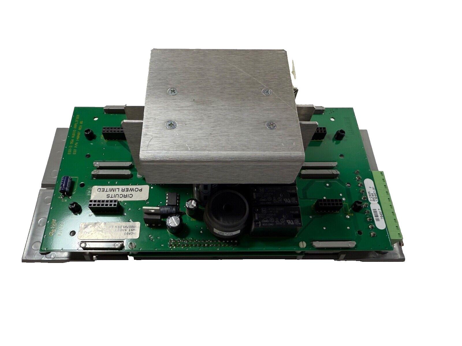 Fire alarm control panel circuit board with power amplifier module and heat sink